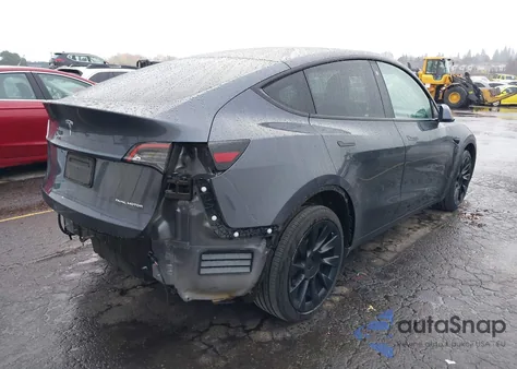 2022 Tesla Model Y Long Range Dual Motor All-Wheel Drive z USA, uszkodzony, nr VIN 7SAYGDEE4NF430216